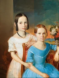 Hermanas contra un fondo de paisaje